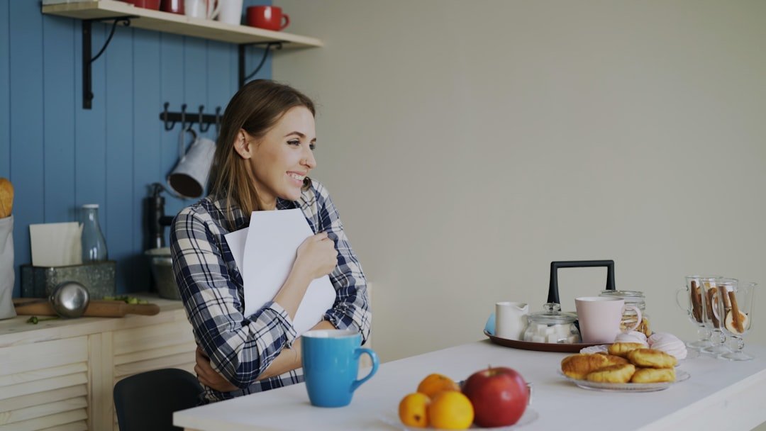 a person reviewing a monthly budget on a laptop at home