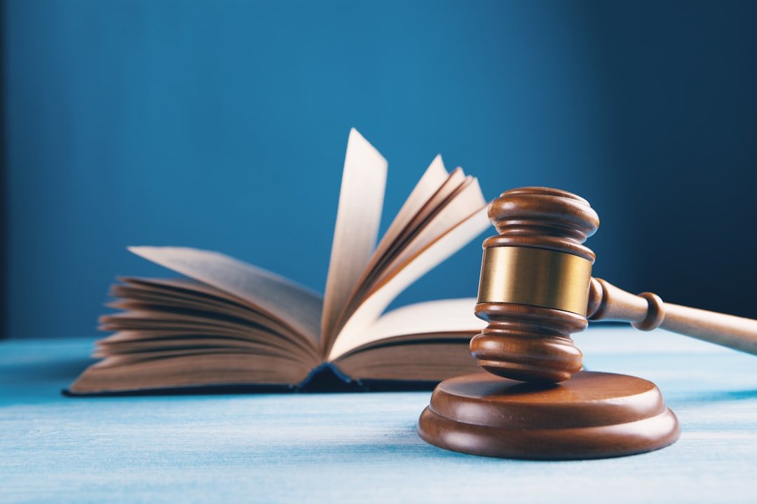 a gavel and open law book representing Korea AI Basic Act compliance obligations