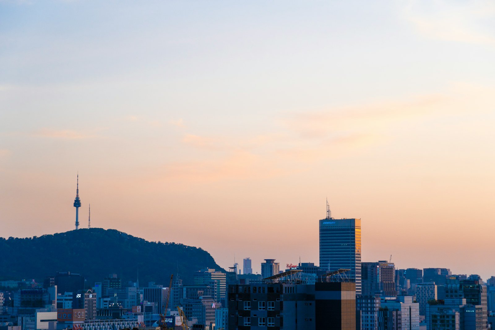 the Seoul skyline at dusk with Namsan tower on the ridge