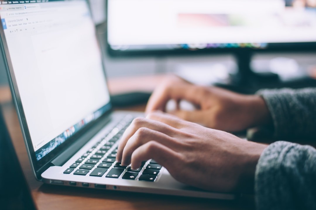 hands typing a search query on a laptop, the naver vs google korea choice in practice