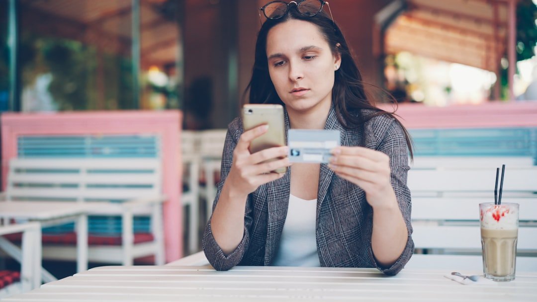 a person paying with a card and phone, the everyday use case for the Toss super app